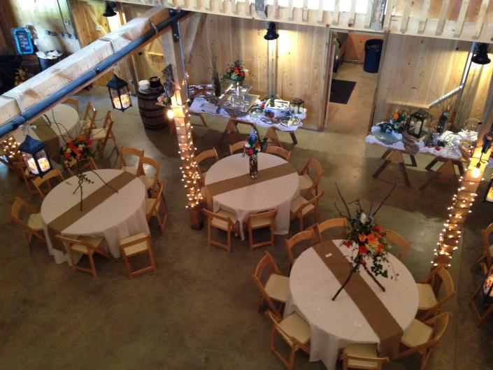 Custom flower arrangements can be done for any theme, such as this rustic wedding.