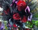 Dark purple cala lillies, red roses, black feathers, just gorgeous!